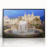 Large abstract wall art featuring a stylized Monaco scenery in muted blues and grays, framed in black acrylic.