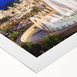 Art deco poster of Monaco scenery in muted blue and beige tones on rolled canvas, suitable for dining room wall art.