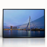 Large abstract wall art depicting a European scenery in muted gray tones on a framed acrylic.