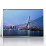 Mid-century modernist art of a European scenery in muted blue and white tones on a framed acrylic.