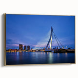 Framed canvas depicting a vintage-style Dutch landscape in muted gold and black tones, ideal for bedroom wall decor.