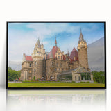 Large abstract wall art of a European cityscape in muted gray tones, framed in black acrylic.