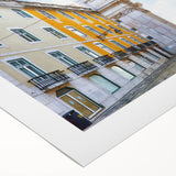 Art deco poster of Lisbon scenery in muted blues and whites on rolled canvas, suitable for dining room wall art.