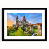 Colorful abstract art print of a European scenery in Romania, in a black frame, suitable for living room decor.