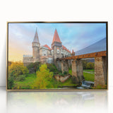 Art deco poster of a European cityscape in Romania, framed in gold acrylic, with muted earth tones.