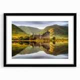 Extra large abstract art print of a colorful, textured Scottish landscape, in a black frame with mat.