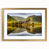 Abstract art print featuring a serene Scottish landscape in muted earth tones on a framed canvas.