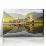 Large art print of a serene Scottish landscape in muted greens and blues, framed in silver acrylic.