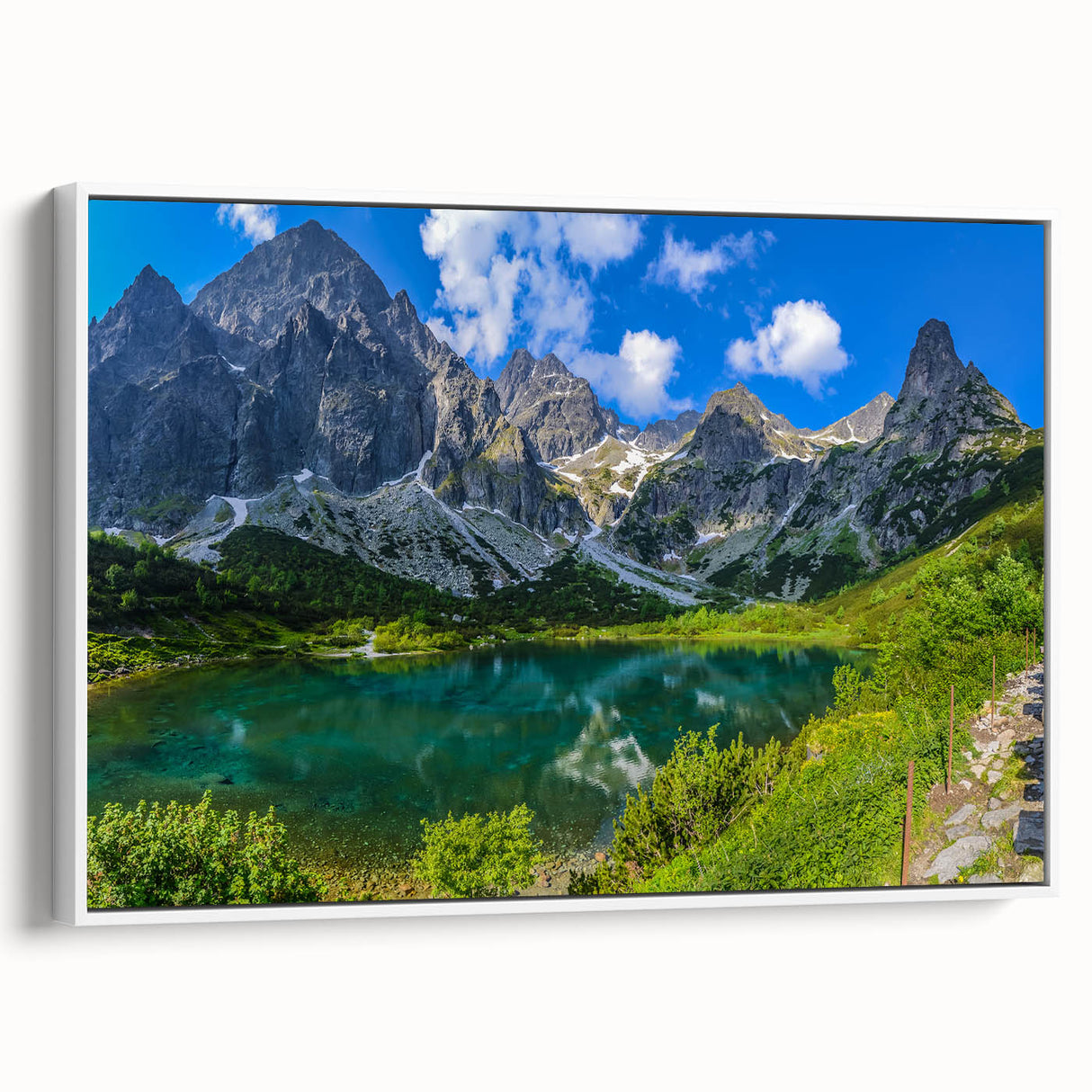 Vintage poster art of a European scenery on a framed canvas, with colorful accents against a black background.