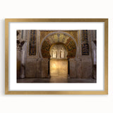 Textured abstract art print of Andalucian scenery in muted earth tones, framed in gold, ideal for bedroom art.
