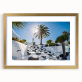 Abstract art print of a European scenery in muted earth tones, framed in gold, ideal for dining room decor.