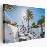 Large stretched canvas depicting a scenic view of the Canary Islands in vibrant blue and green tones.