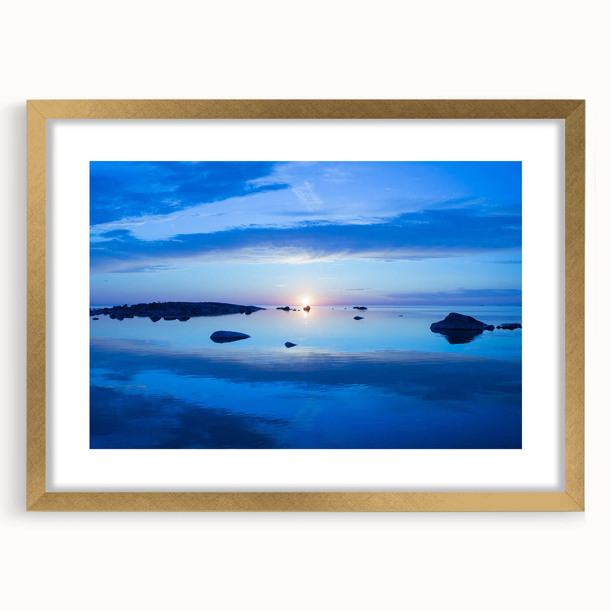 Extra large abstract art print of a textured European scenery in muted earth tones, framed in gold.