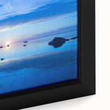 Black wall art featuring a textured depiction of a European landscape in vibrant colors on a framed canvas.