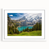Abstract art print of a Swiss landscape in cool blue and green hues, framed with a white mat, ideal for dining room decor.