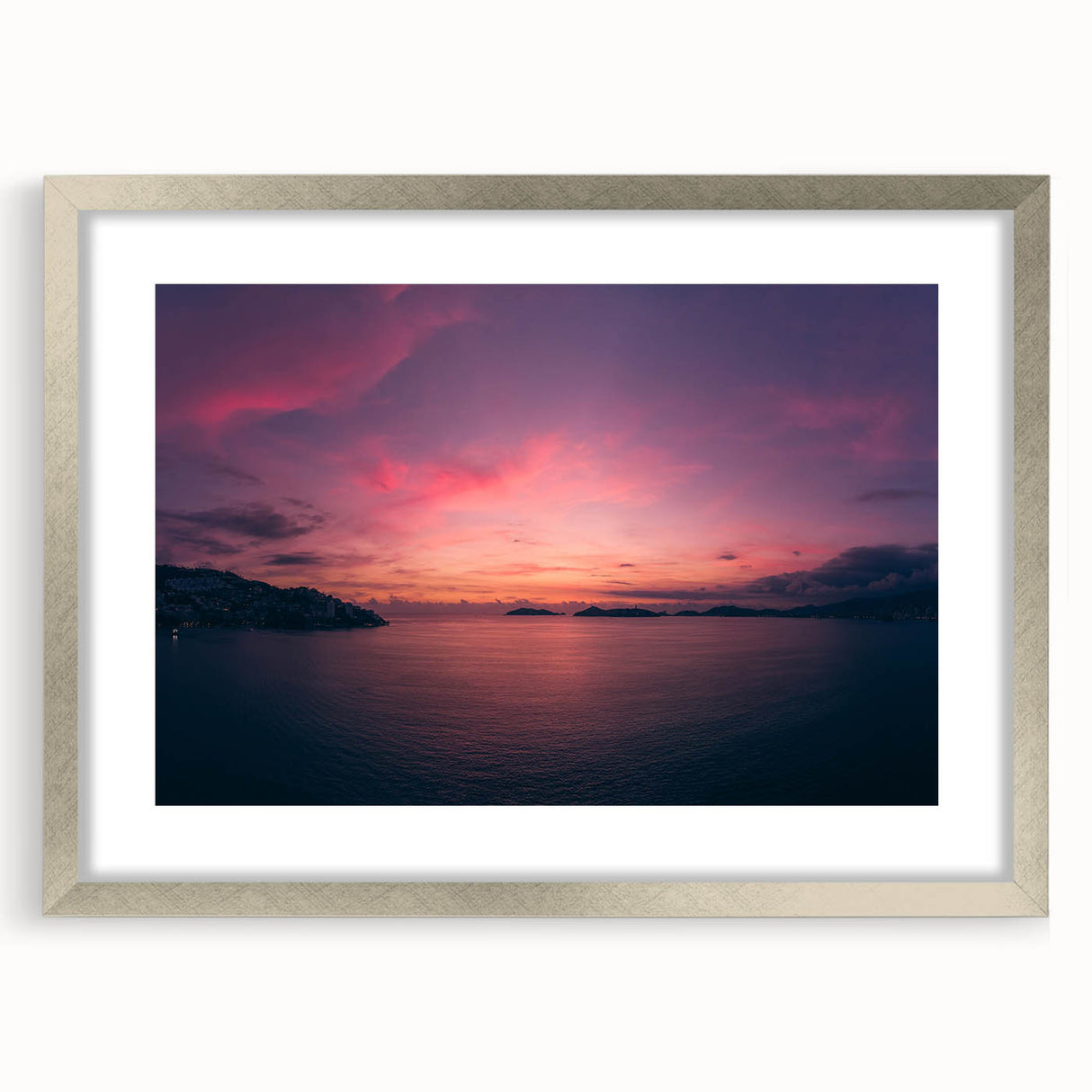 Textured abstract art print of Acapulco scenery in muted earth tones, framed in silver, ideal for bedroom art.