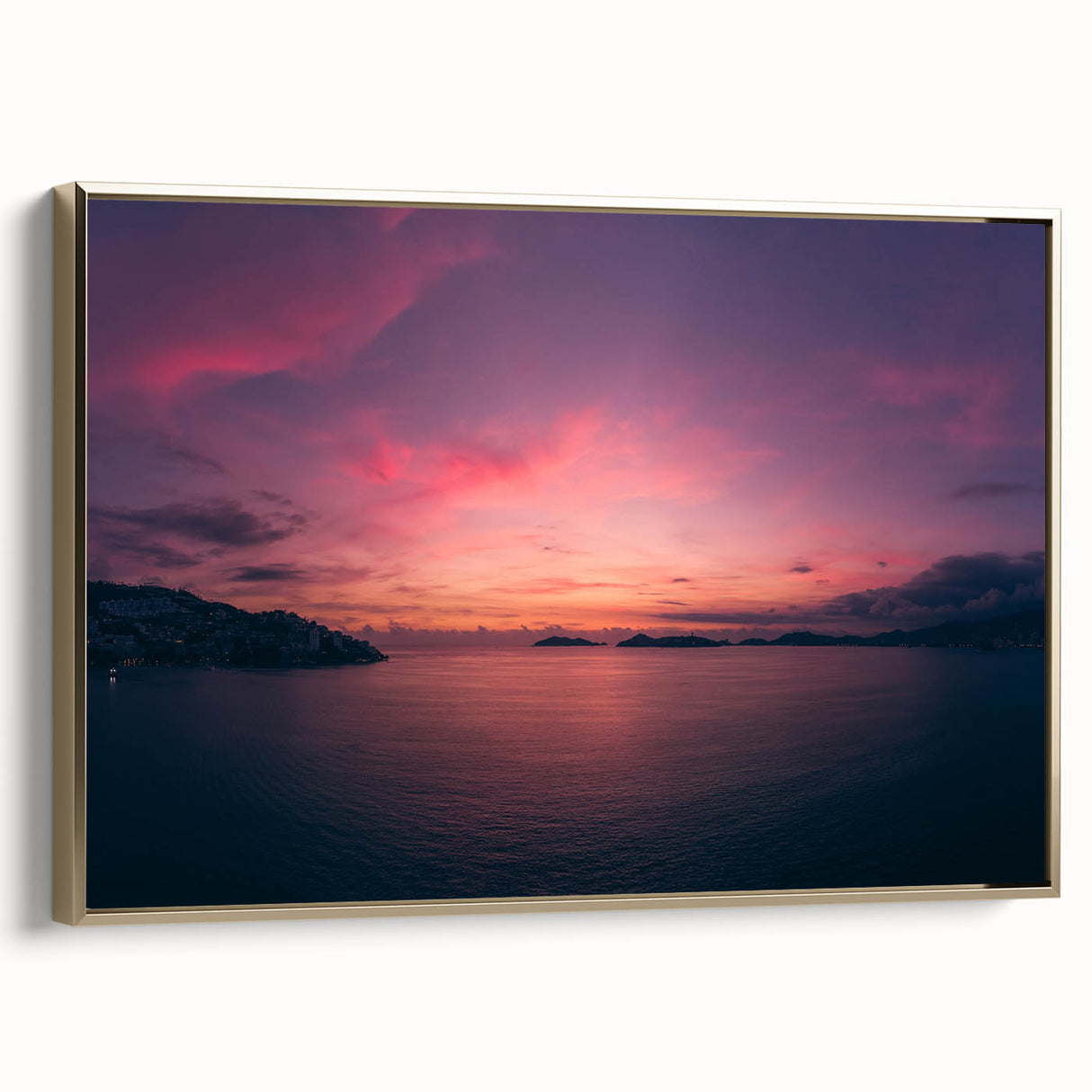 Framed canvas wall art depicting a vintage Acapulco landscape in muted gold and black tones, ideal for bedroom decor.