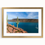 Extra large abstract art print of Baja California scenery in gold frame, featuring textured brush strokes in earth tones.