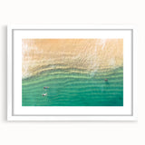Abstract art print of Cabo San Lucas with vibrant blue and white tones on a framed white mat, ideal for dining room decor.