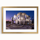 Extra large abstract art print of Mexico City, featuring textured strokes in gold and earth tones on a framed canvas.