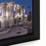 Close-up of black wall art featuring a textured Mexico City scenery on a framed canvas, with colorful accents.