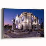 Framed canvas of a vintage Mexico City landscape painting featuring colorful buildings and a black sky.