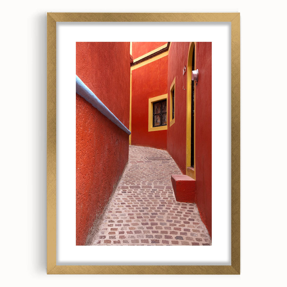 Extra large textured abstract art print of Guanajuato, Mexico, in muted earth tones on a gold-framed canvas.