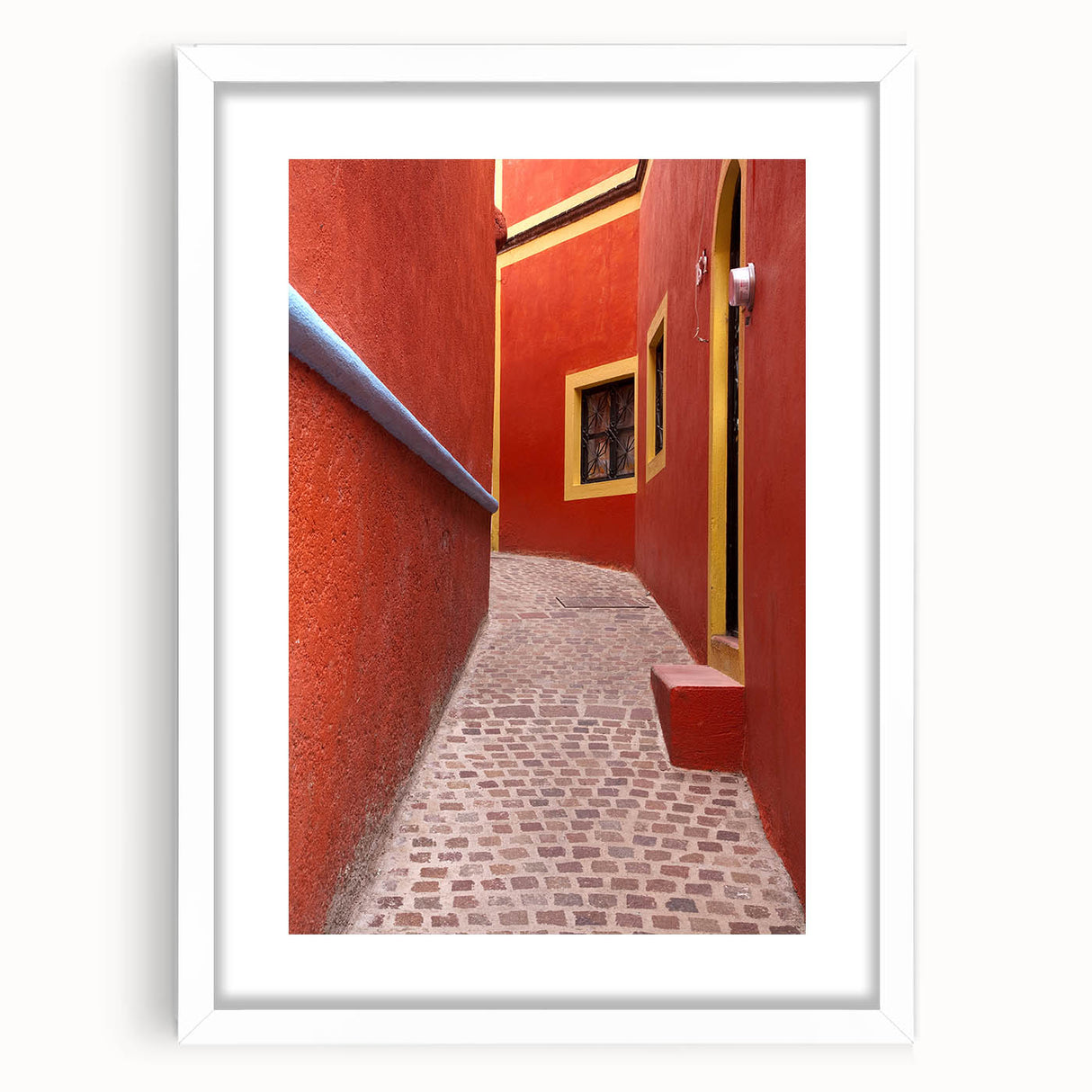 Abstract art print of Guanajuato scenery in vibrant colors on a white framed poster, ideal for dining room decor.