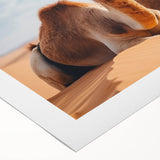 Art deco poster featuring a stylized Middle Eastern scenery in muted earth tones on rolled canvas.