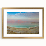 Extra large wall art featuring an abstract depiction of the Dead Sea in textured hues of blue and beige, framed in gold.