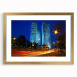 Extra large abstract art print of Tel Aviv skyline in textured gold frame, ideal for living room decor.