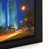 Extra large framed canvas of Tel Aviv skyline in black with colorful, textured art accents, ideal for living room decor.