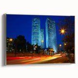 Framed canvas featuring a vintage-style landscape painting of Tel Aviv with vibrant, colorful art on a black background.