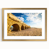 Extra large framed wall art of abstract Middle Eastern scenery in textured gold tones, ideal for living room decor.