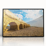 Large abstract wall art featuring a mid-century modernist depiction of Middle-Eastern scenery in muted earth tones.