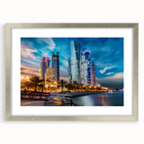 Textured abstract art print of Middle Eastern scenery in muted earth tones, framed in silver, suitable for bedroom decor.