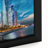 Extra large framed canvas featuring a textured depiction of a Middle Eastern scenery in black with colorful accents.