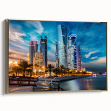 Framed canvas featuring a vintage-style landscape painting of a Middle Eastern scenery in gold and black tones.