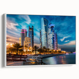 Vintage poster art of a Qatari landscape on a framed canvas, featuring vibrant colors and black accents.