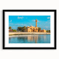Extra large colorful abstract art print of a textured Saudi Arabian scenery in a black frame, suitable for living room decor.