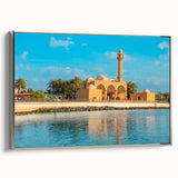 Framed canvas featuring a vintage-style landscape painting of a Middle Eastern desert scene in muted earth tones.
