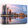 Large abstract wall art of Abu Dhabi skyline in muted blue and gray tones on acrylic glass.