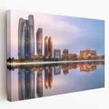 Panoramic Abu Dhabi skyline on large stretched canvas with soft blue and white tones, suitable for kitchen wall art.