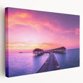 Side view of a stretched canvas featuring a serene Fiji beach scene with soft blue and white tones.