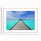 Abstract art print of Bora Bora's serene waters in cool blue tones, framed with a white mat.