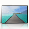 Large abstract wall art depicting the serene Bora Bora landscape in muted blue and green tones, framed in black acrylic.