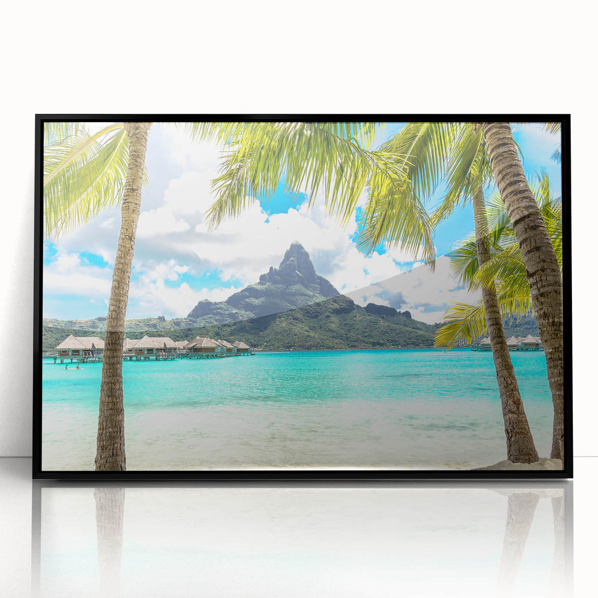 Large abstract wall art depicting a serene Tahitian landscape in muted blues and greens, framed in black acrylic.