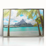 Mid-century modernist art depicting Tahiti's oceanic landscape on a silver-framed acrylic print.