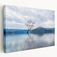 Side view of a stretched canvas depicting the Otago, New Zealand scenery in soft blue and green tones.