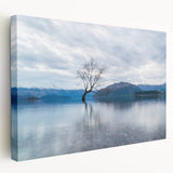 Side view of a stretched canvas depicting the Otago, New Zealand scenery in soft blue and green tones.